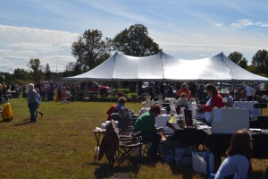 Other vendors at the Easton Oktoberfest, the food station, and the tent where the band was playing